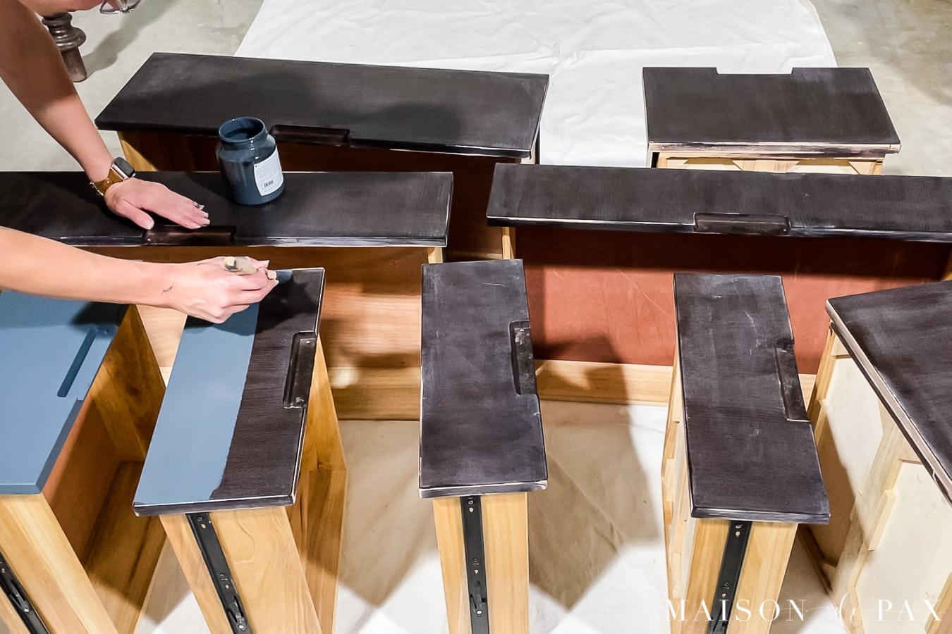 long brush strokes to paint a dresser drawer