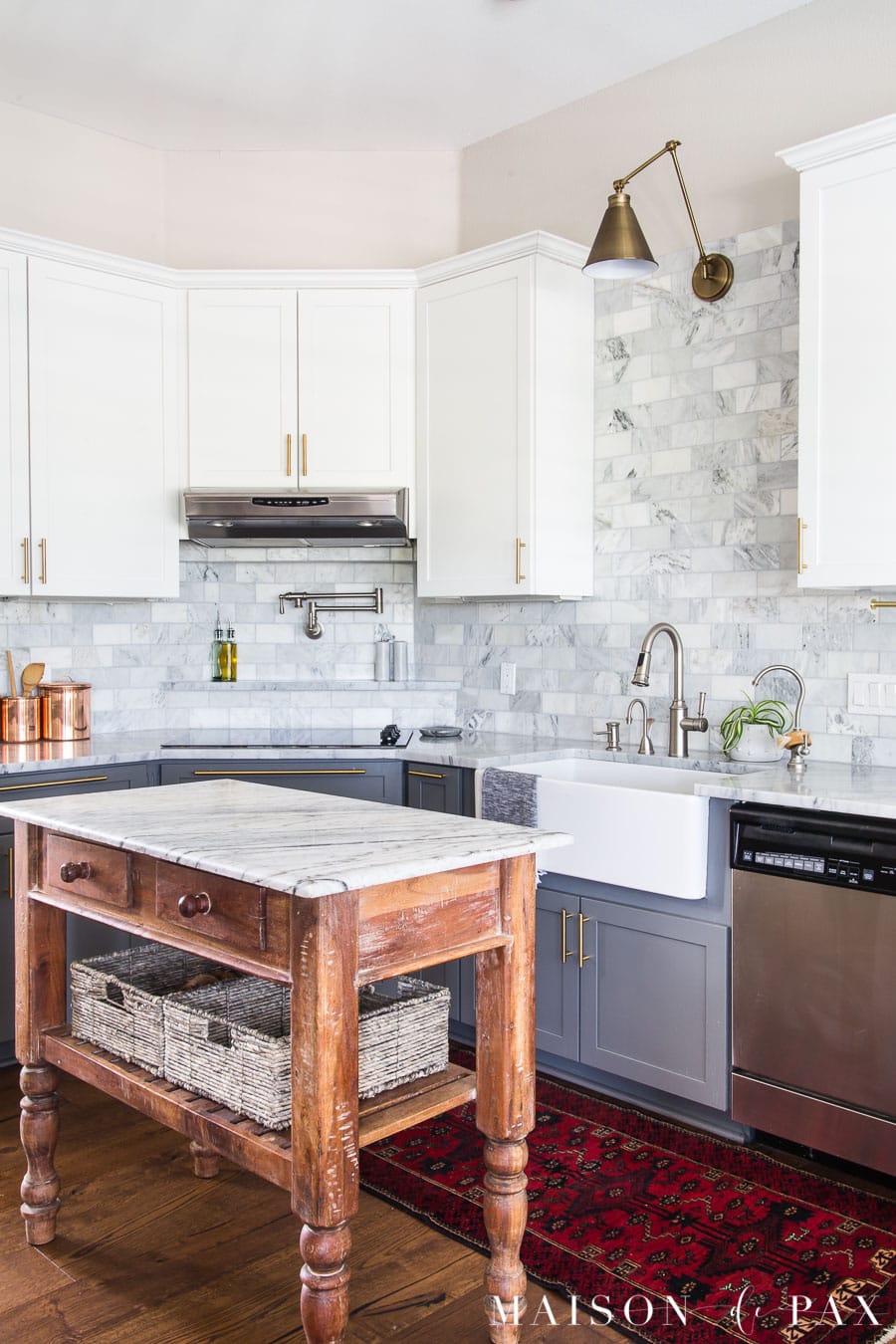 marble kitchen with small wood island | Maison de Pax