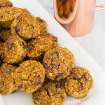 Gluten free pumpkin muffins with chocolate chips: Made with applesauce and a touch of maple syrup for sweetening, oat flour, and pumpkin, these are packed with delicious flavor and nutritious ingredients #gf #glutenfree #pumpkinspice #fallrecipe #pumpkinrecipe #pumpkinmuffins #breakfast #gfbreakfast