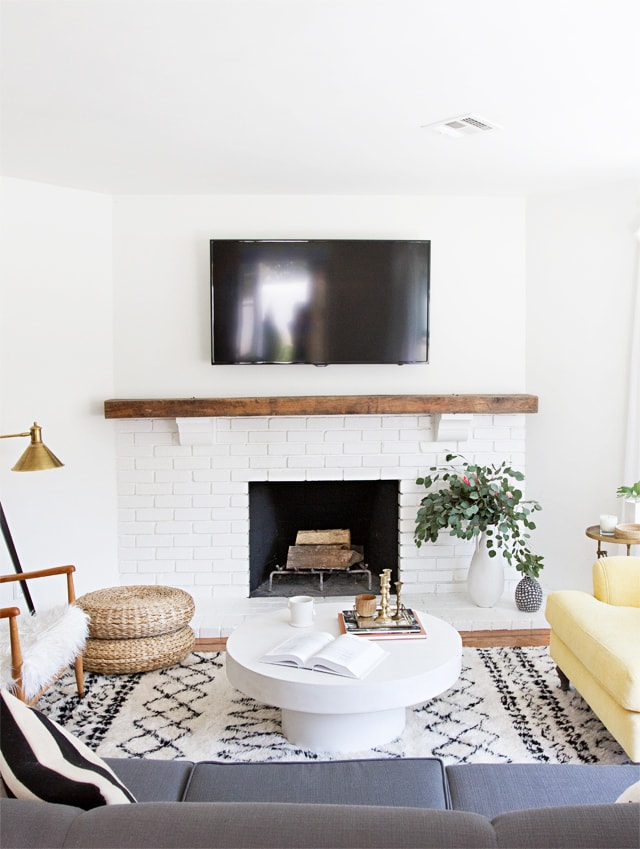 Sarah Sherman Samuel - white painted brick fireplace surround