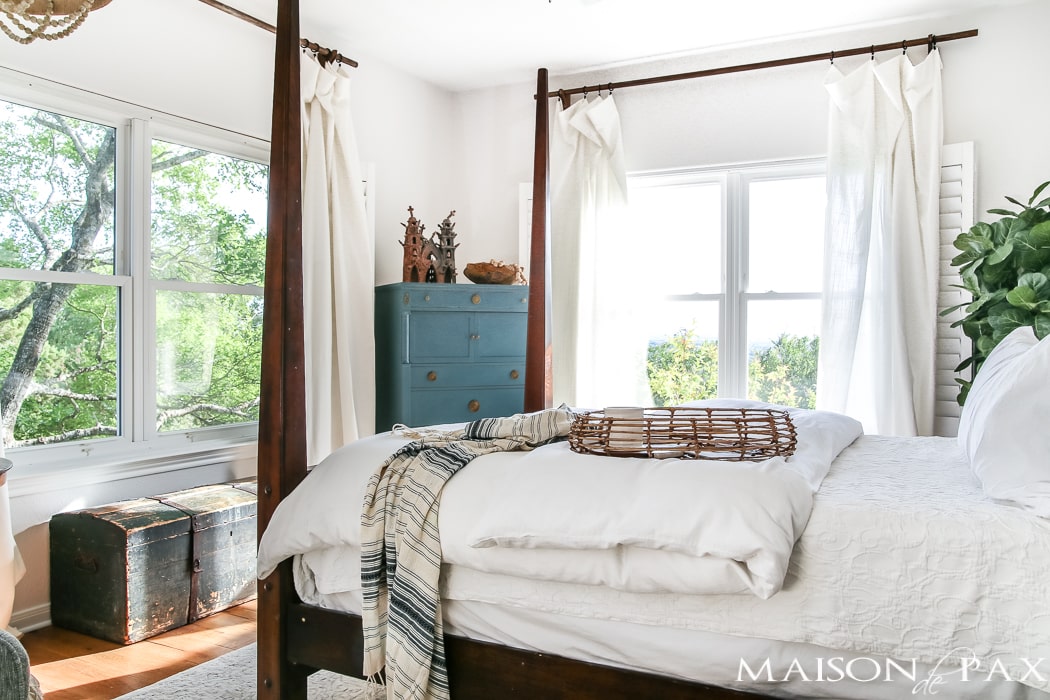 Relaxed, natural, neutral master bedroom with lots of white and touches of boho texture... the perfect retreat!
