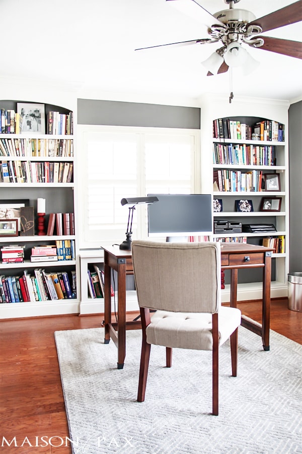 Gray and white office with the wood desk and floors... and those built-in bookshelves! aiweb9ygdry.cmersite.com