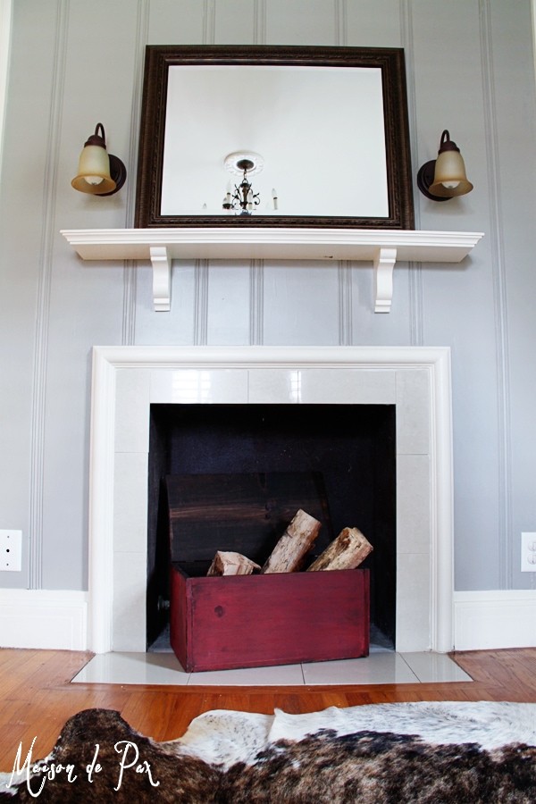 choosing the right color: a soft, warm gray brings light and comfort to a paneled office