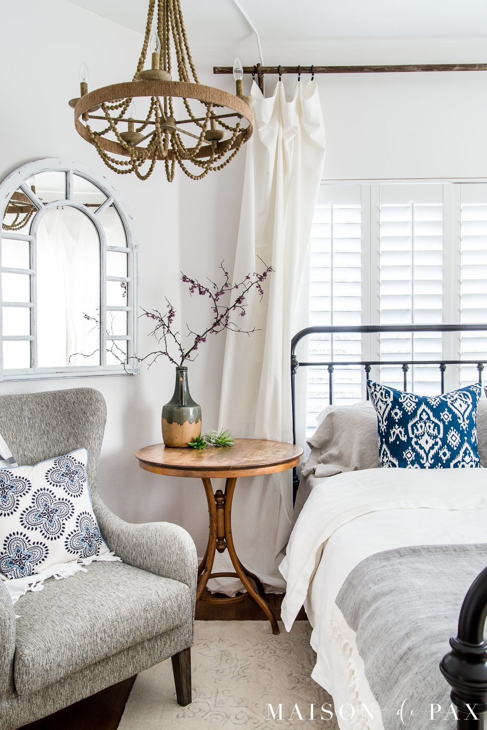 tip #4: create a floral focal point... Looking to add a seasonal touch to your bedroom?  Don't miss these incredibly simple master bedroom decorating ideas for spring! #springdecor #springbedroom #nightstand #modernfarmhouse