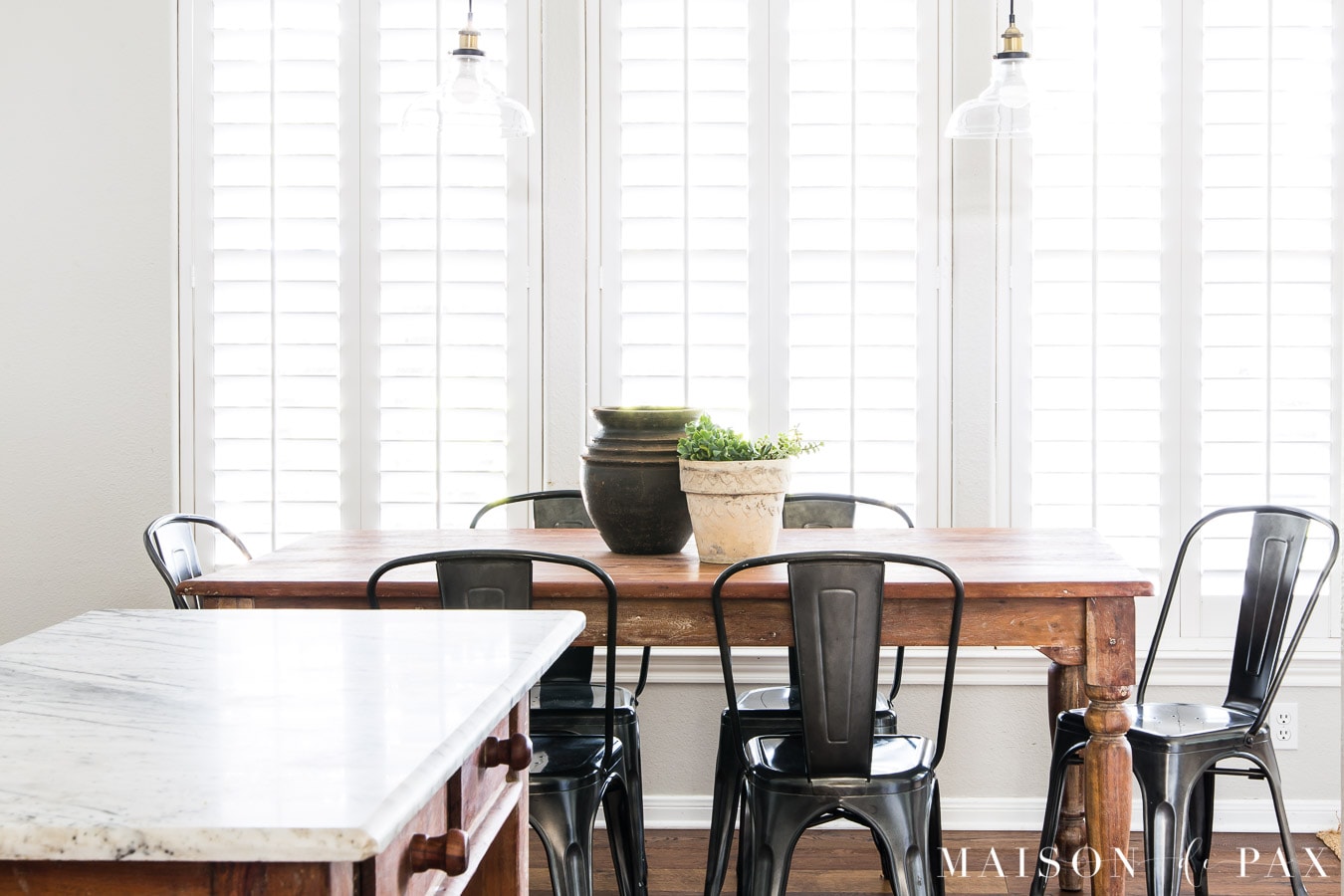 farmhouse kitchen table with black metal chairs | Maison de Pax
