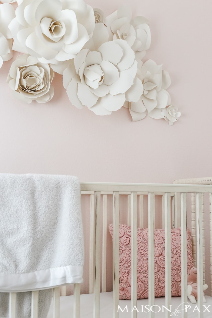 Paper flowers above the crib- Maison de Pax