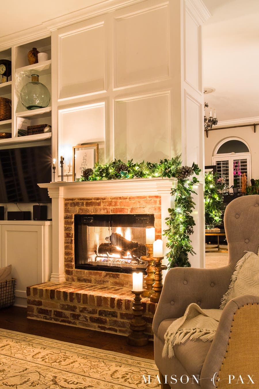 fireplace with asymmetrical garland and candles | Maison de Pax