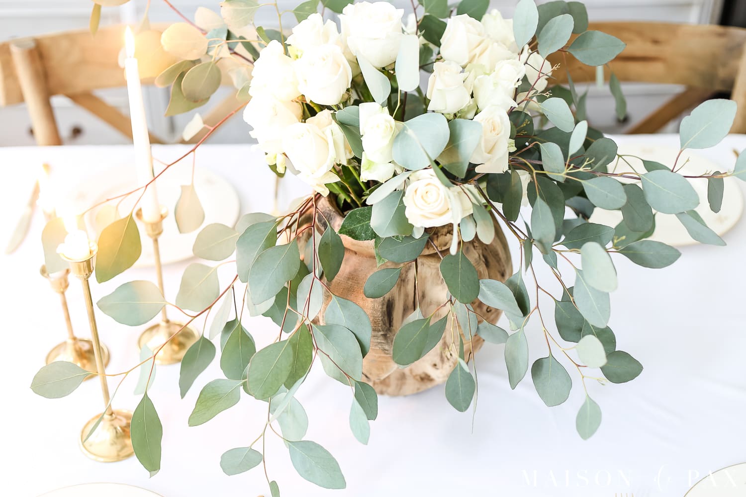 Romantic centerpiece: white roses and eucalyptus centerpiece- Maison de Pax