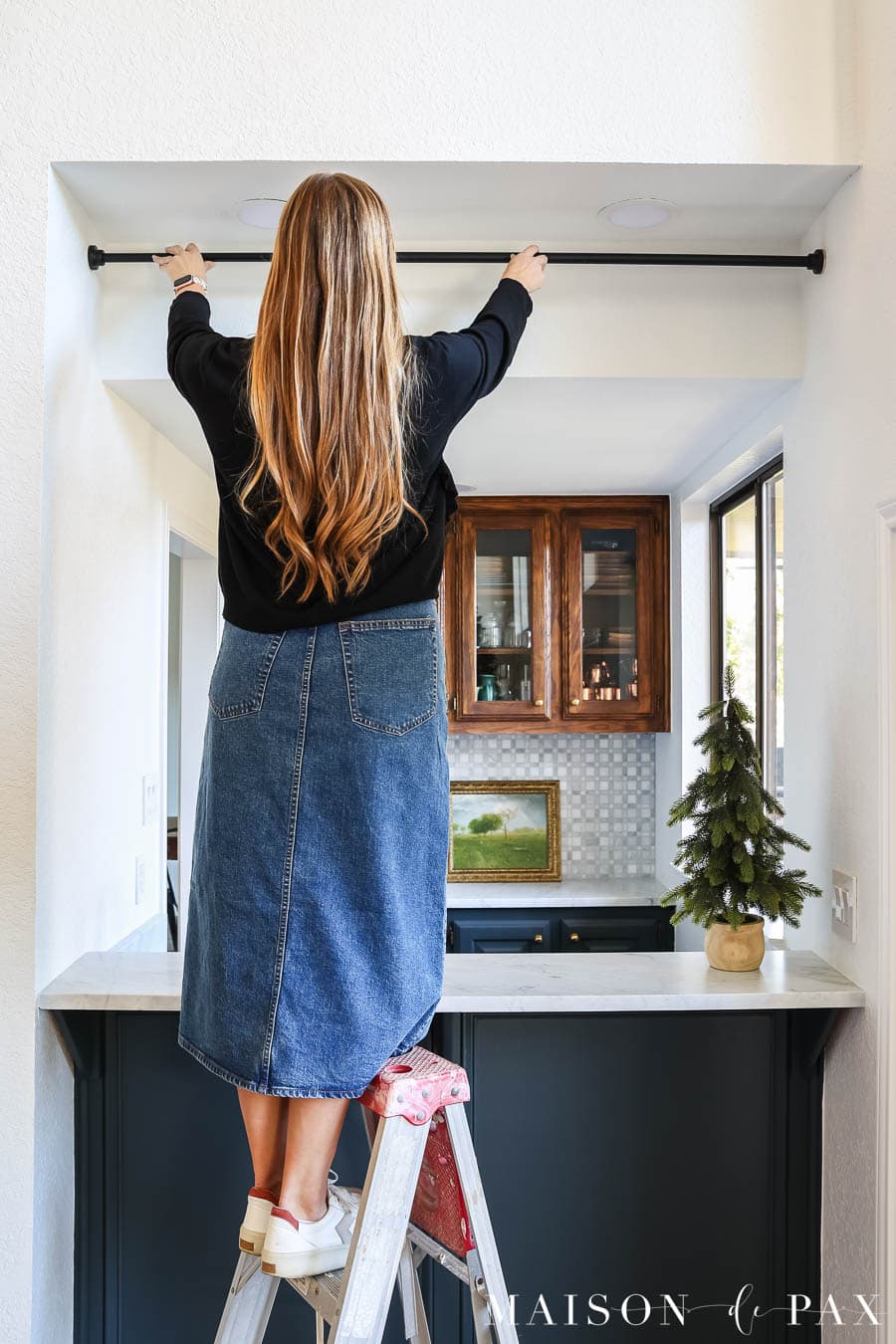 use tension rod to hang garland