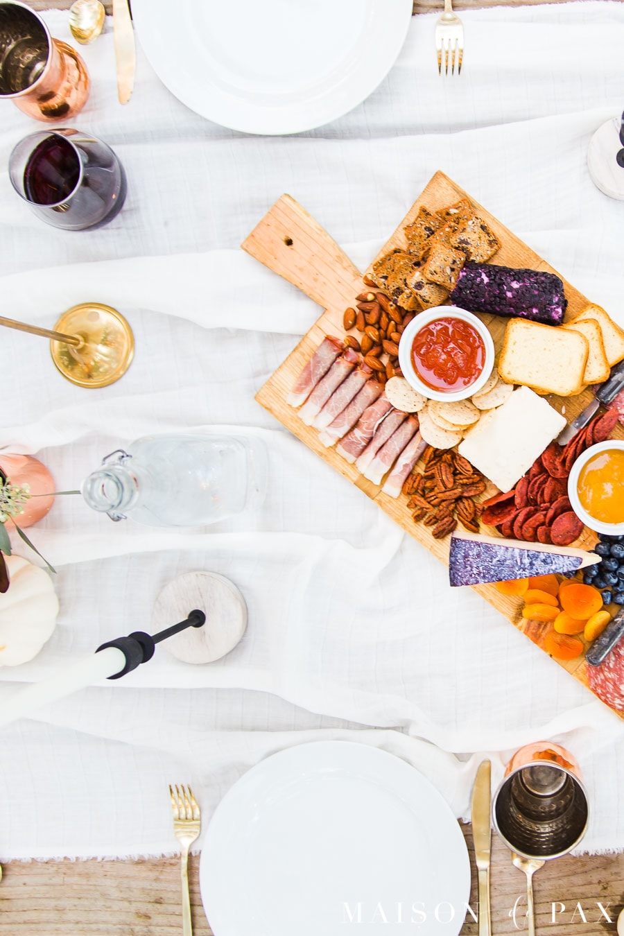 outdoor dining ideas charcuterie board candlesticks