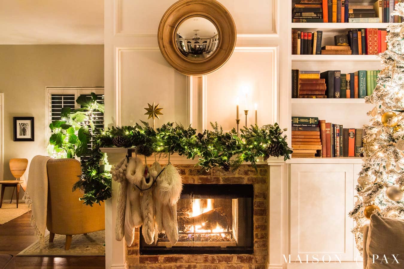 fireplace with asymmetrical garland and lights | Maison de Pax
