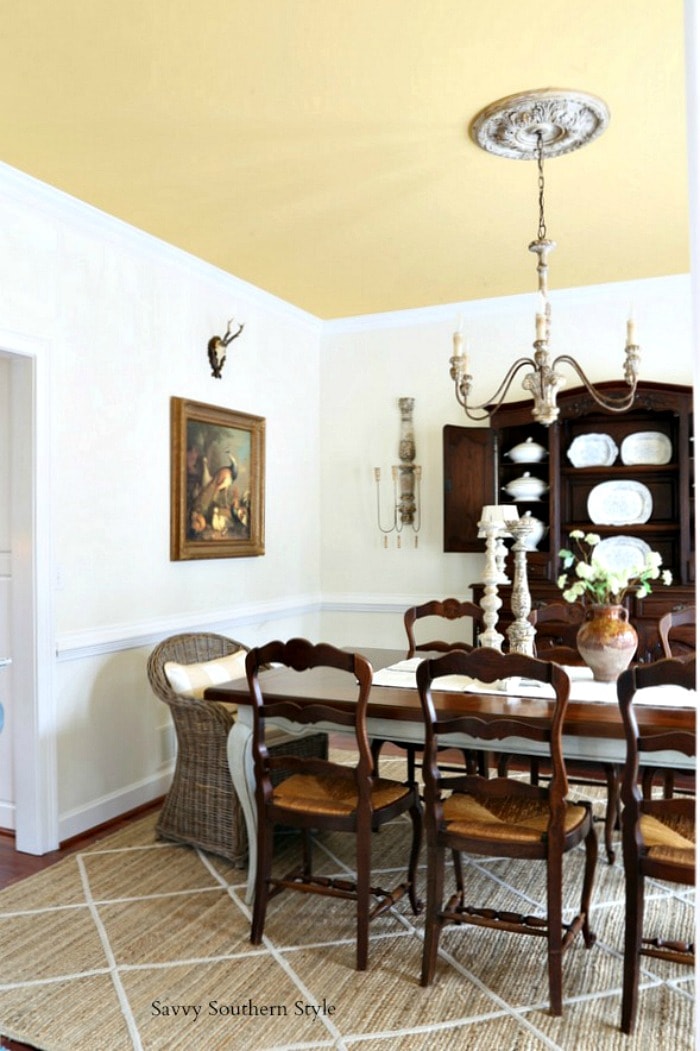 Swapping chairs in a French country dining room