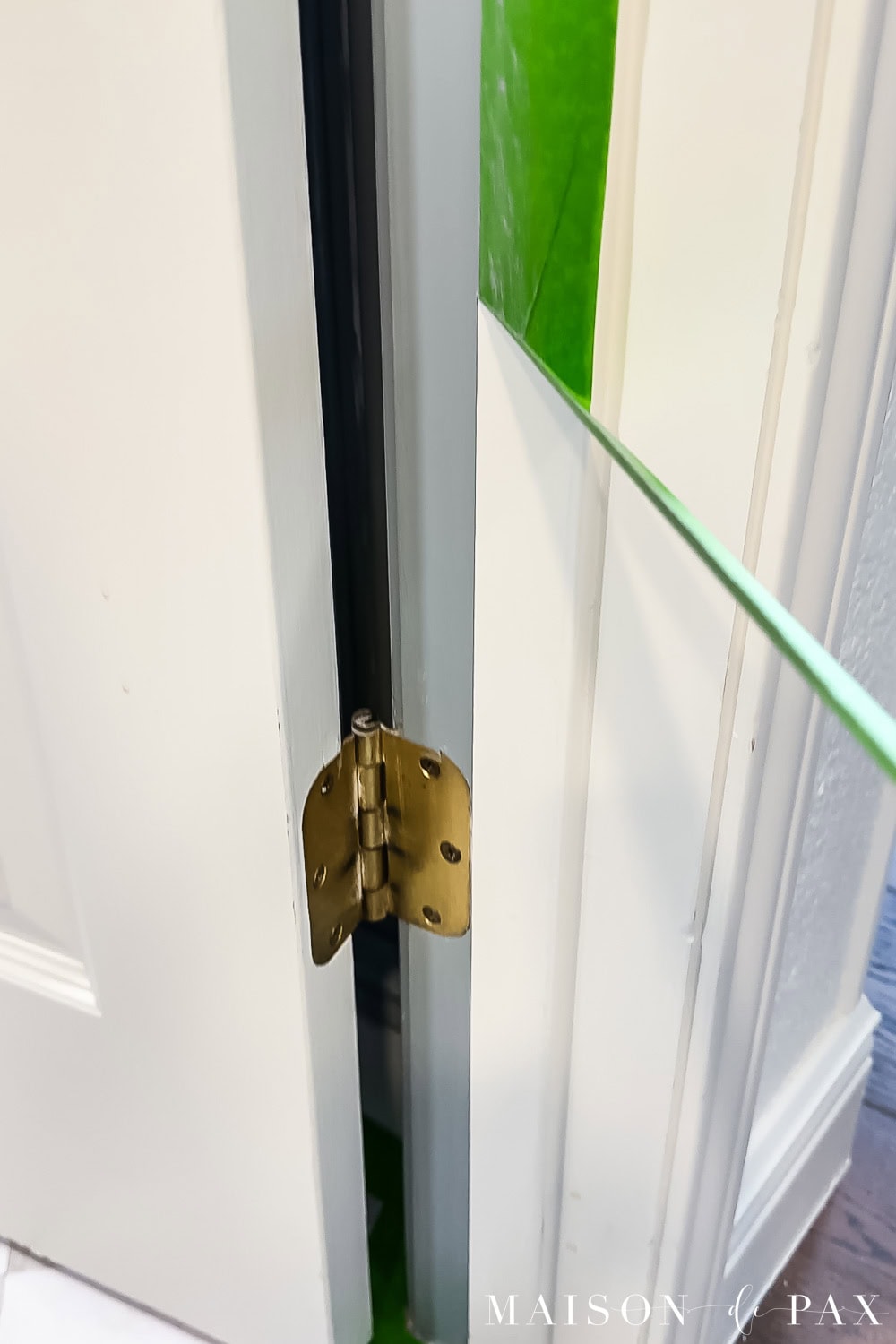 removing tape for crisp lines when painting interior doors and trim
