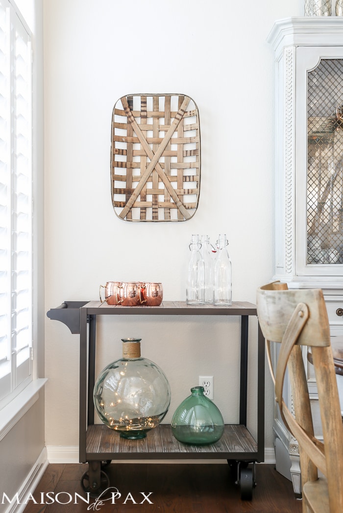 simple greenery and mercury glass makes this French farmhouse style dining room all set for Christmas!