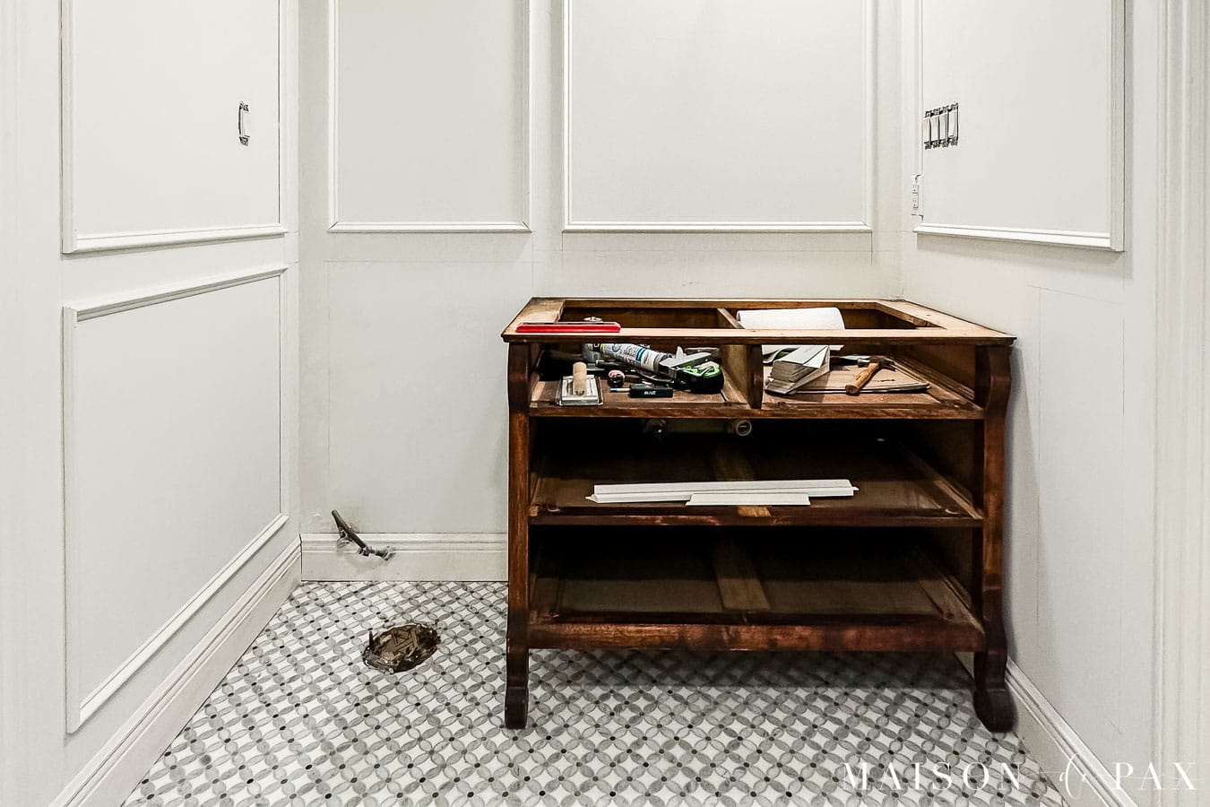 attach dresser to wall as vanity