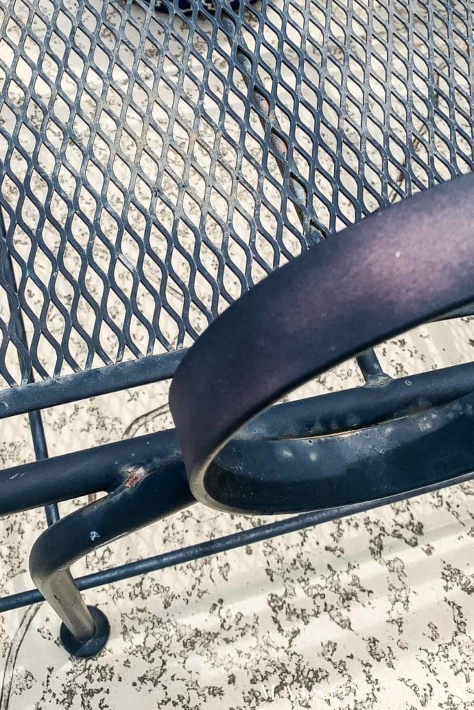 black metal outdoor furniture tired rusty