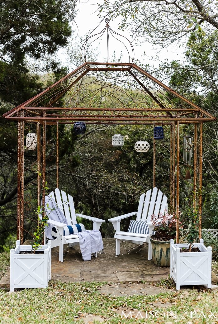 Iron arbor decorated for spring- Maison de Pax