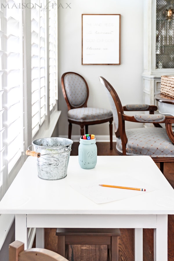 Kid craft table makeover: perfectly kid sized but stylish enough for the dining room; painted in Behr Ivory Keys | aiweb9ygdry.cmersite.com