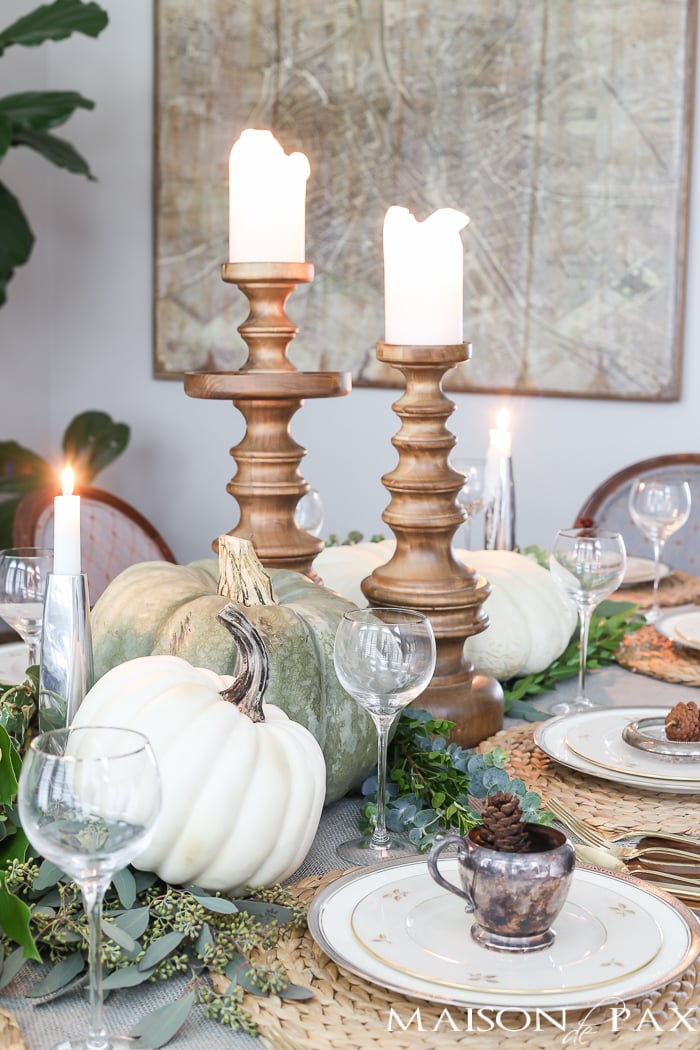 White pumpkins and wooden candlesticks- Maison de Pax