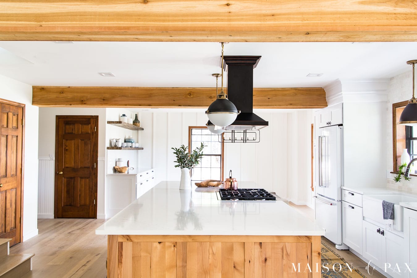 rustic cedar beams and rustic alder kraftmaid island cabinets | Maison de Pax
