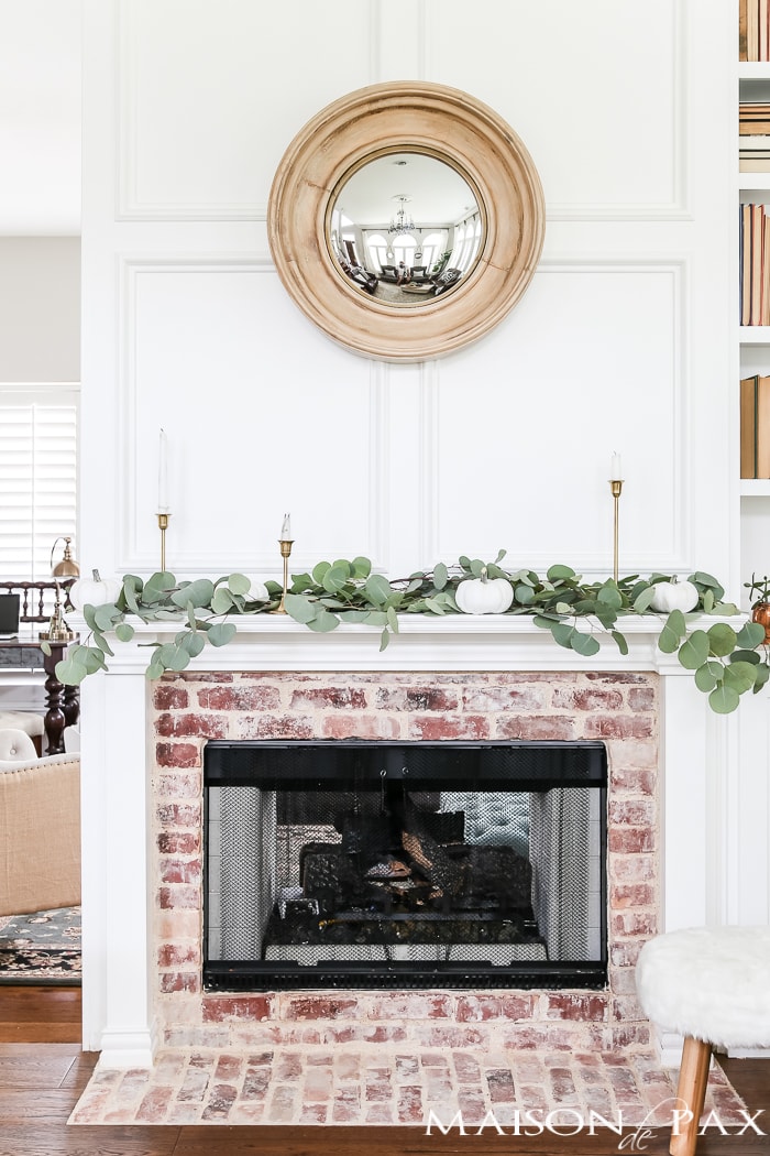 white mantel with white pumpkins and eucalyptus #falldecor