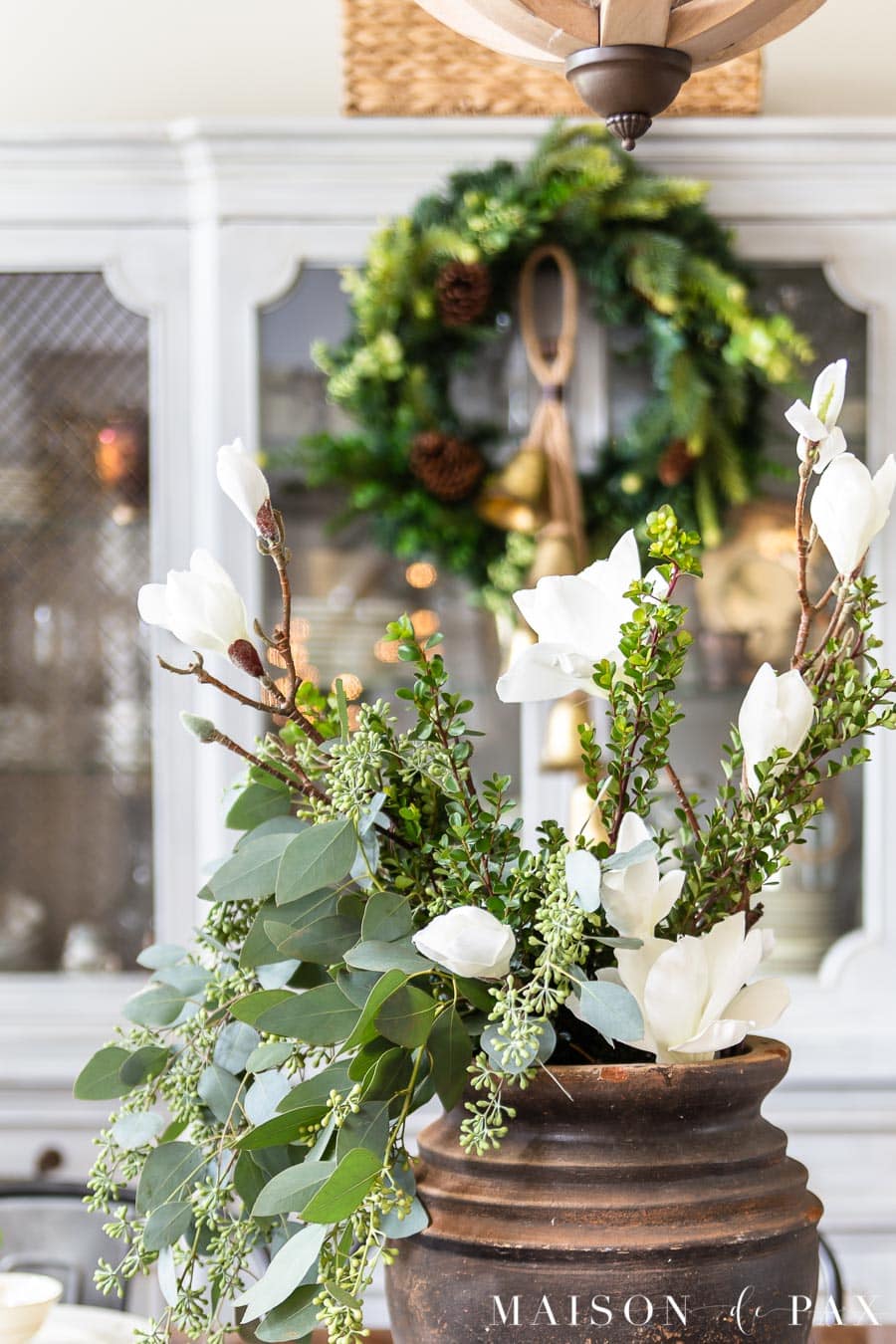 magnolia flowers, fresh greenery, and seeded eucalyptus | Maison de Pax
