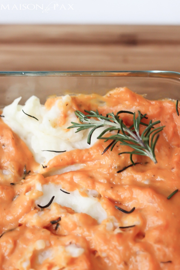Deliciously seasoned sweet and golden potatoes. Swirled. Baked. You'll never make two separate dishes again! via aiweb9ygdry.cmersite.com #recipe #mashed #potatoes #sweet #thanksgiving #fall