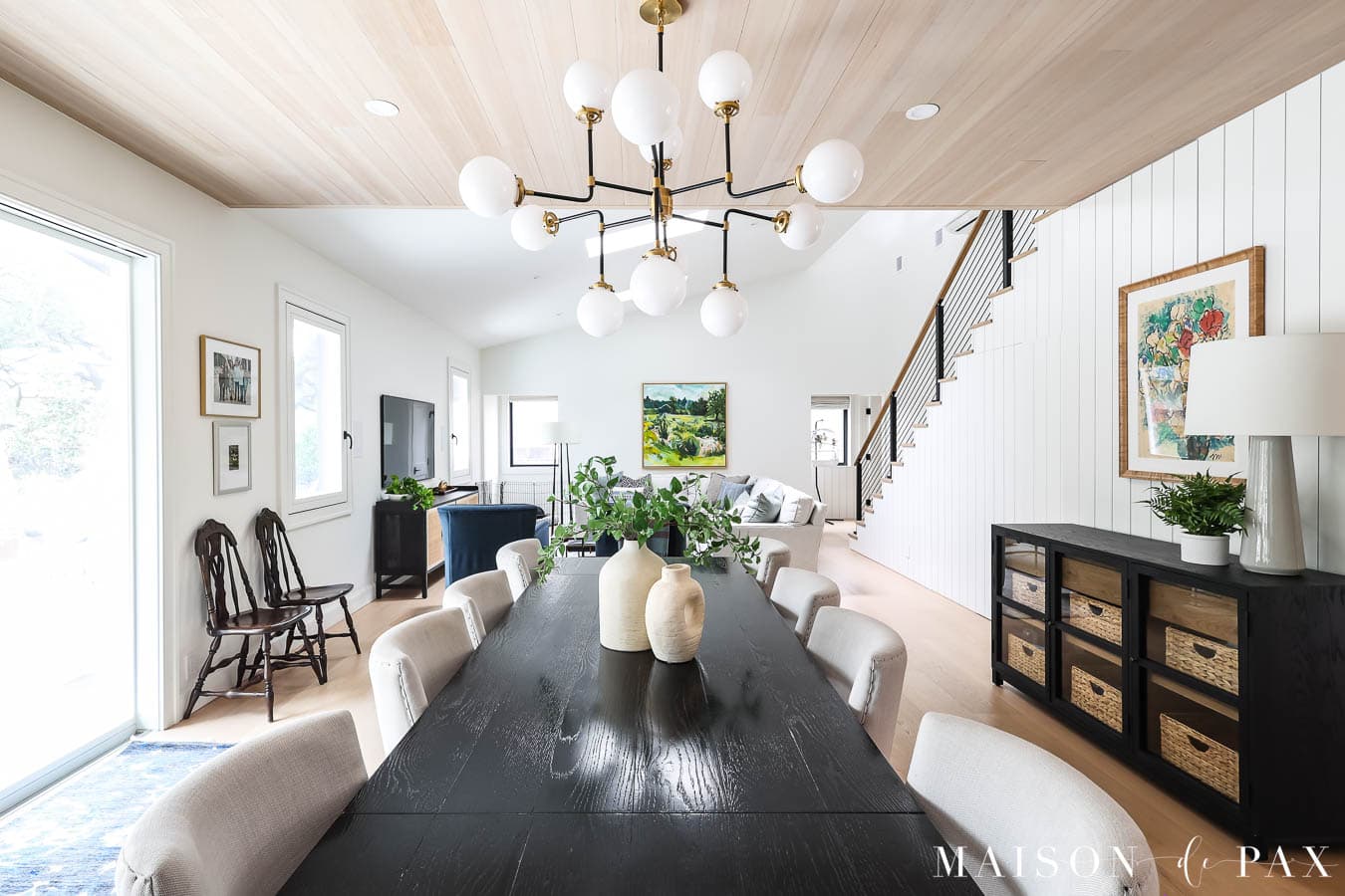 open dining and living rooms with sw pure white walls and trim