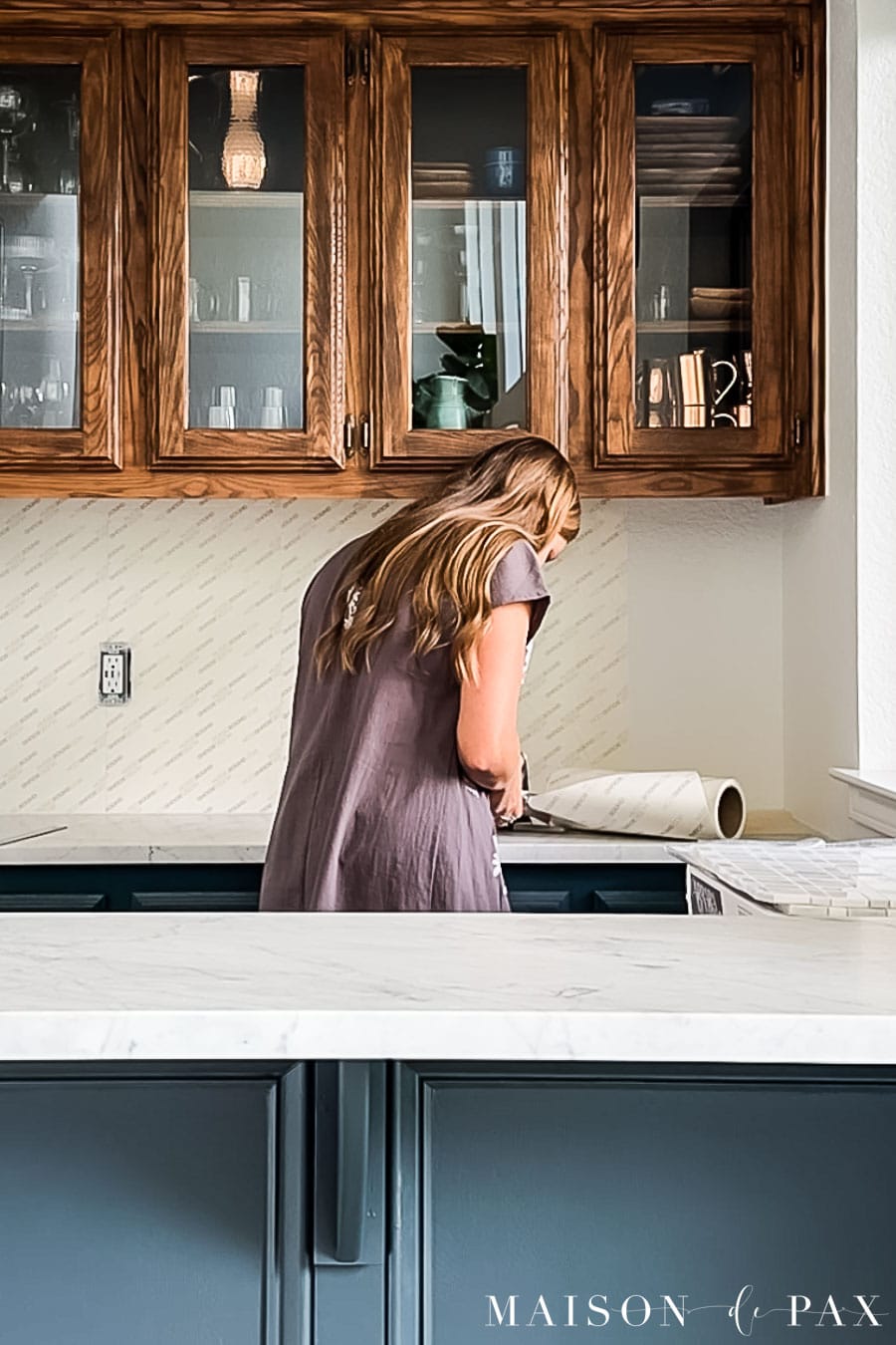 using scissors to cut around outlet when installing backsplash with musselbound