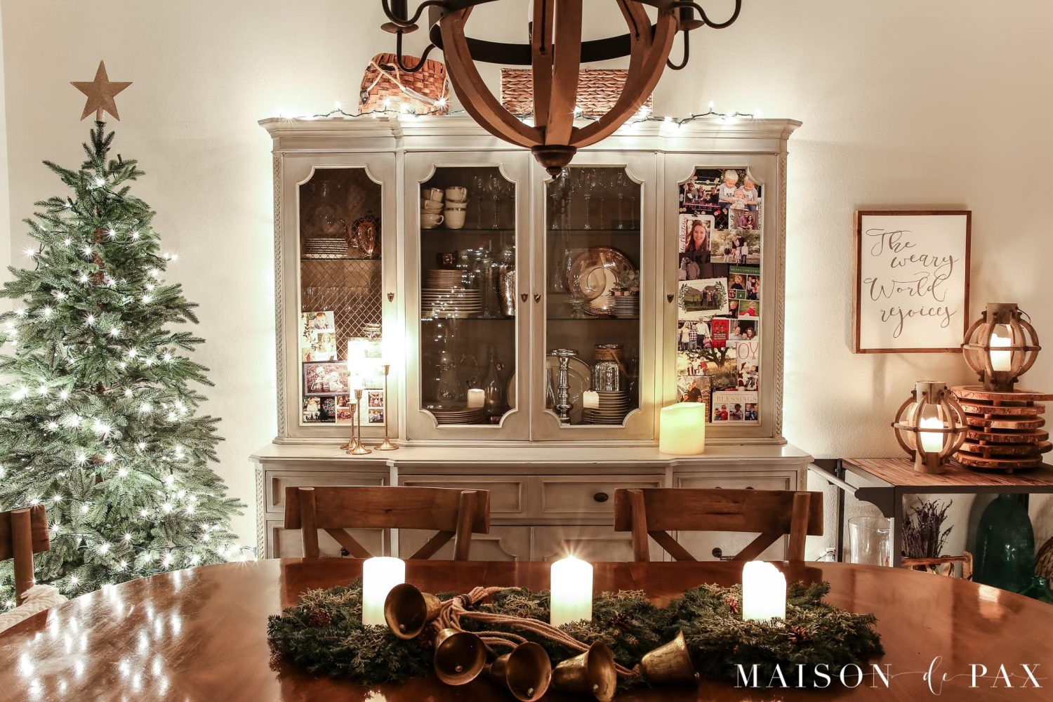china cabinet strung with lights: gorgeous Christmas lights at night in these 25+ home tours #christmasnightstour #holidayhometour #christmaslights