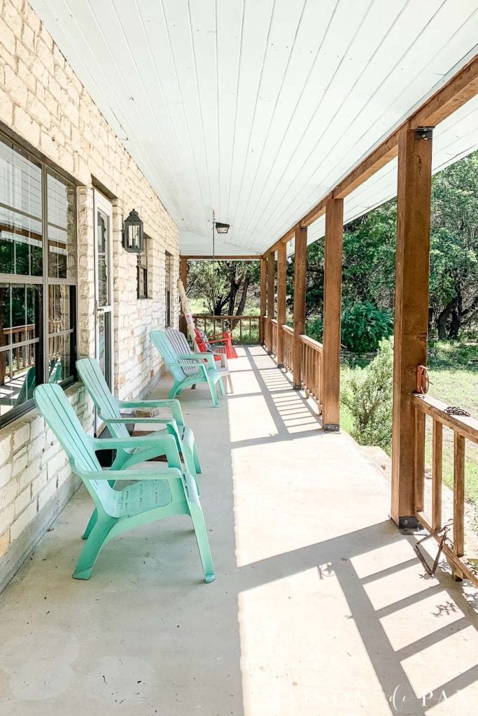 concrete porch with cedar posts and railing | Maison de Pax