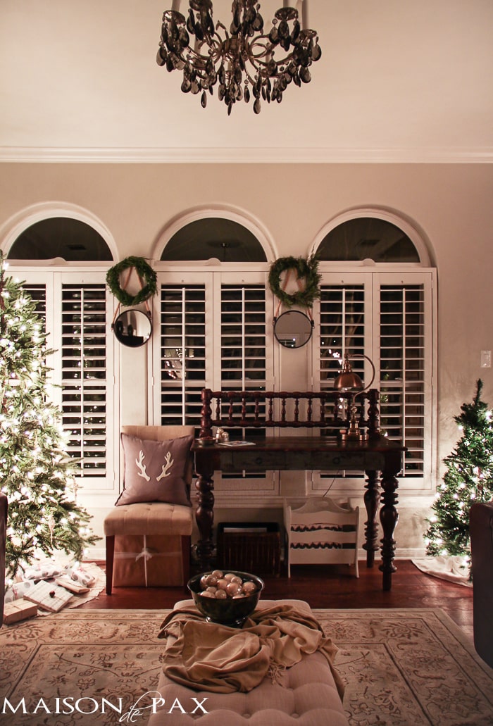 holiday decorating: christmas tree with white lights and mercury glass, antler pillow, wreath, mini tree