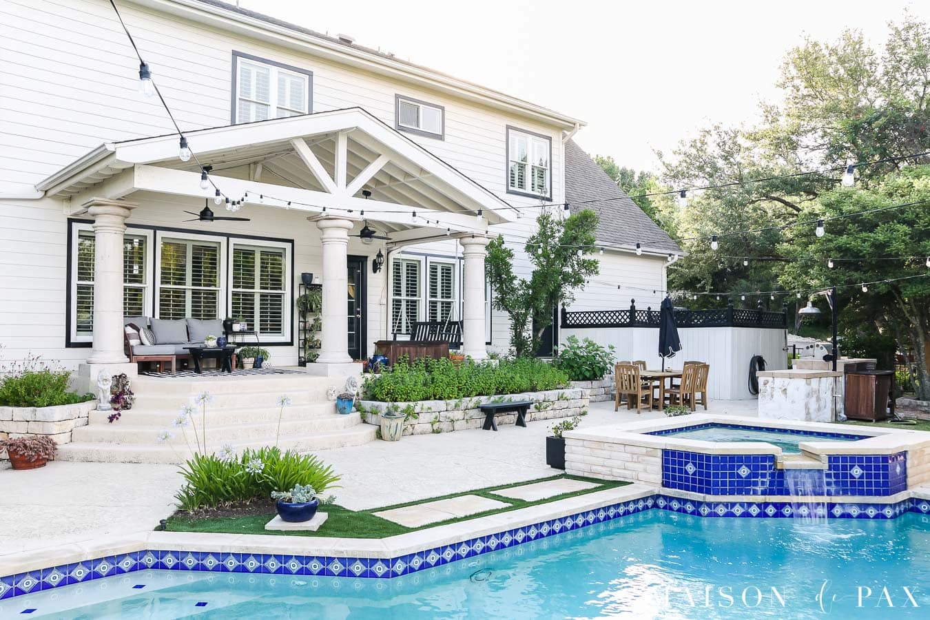 black and white house with blue accents