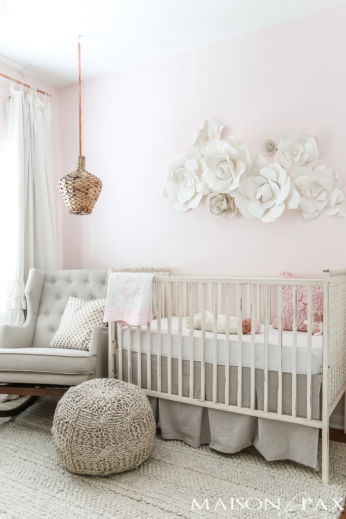 Looking for soft, feminine, modern nursery decor? With tons of textured neutrals and copper accents, this blush nursery is both sweet and sophisticated. Get ideas and inspiration for DIY projects and sources for your little girl's nursery!