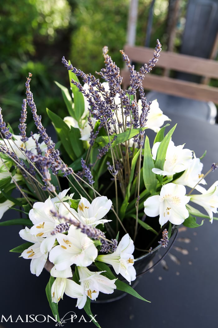 lavender and alstroemeria in a rustic bucket - such a simple and elegant centerpiece | aiweb9ygdry.cmersite.com