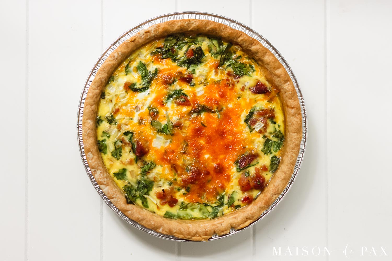 beautiful round ham and spinach quiche