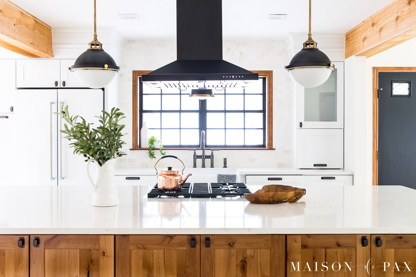 wood island with white quartz countertops kitchen | Maison de Pax