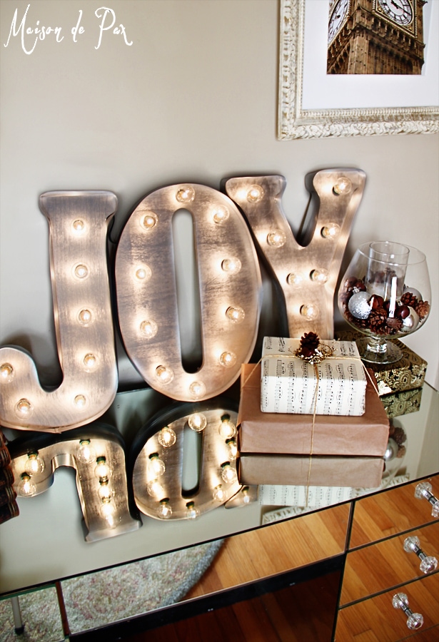 simple and stunning gift wrap ideas: juxtapose rustic and sparkly elements