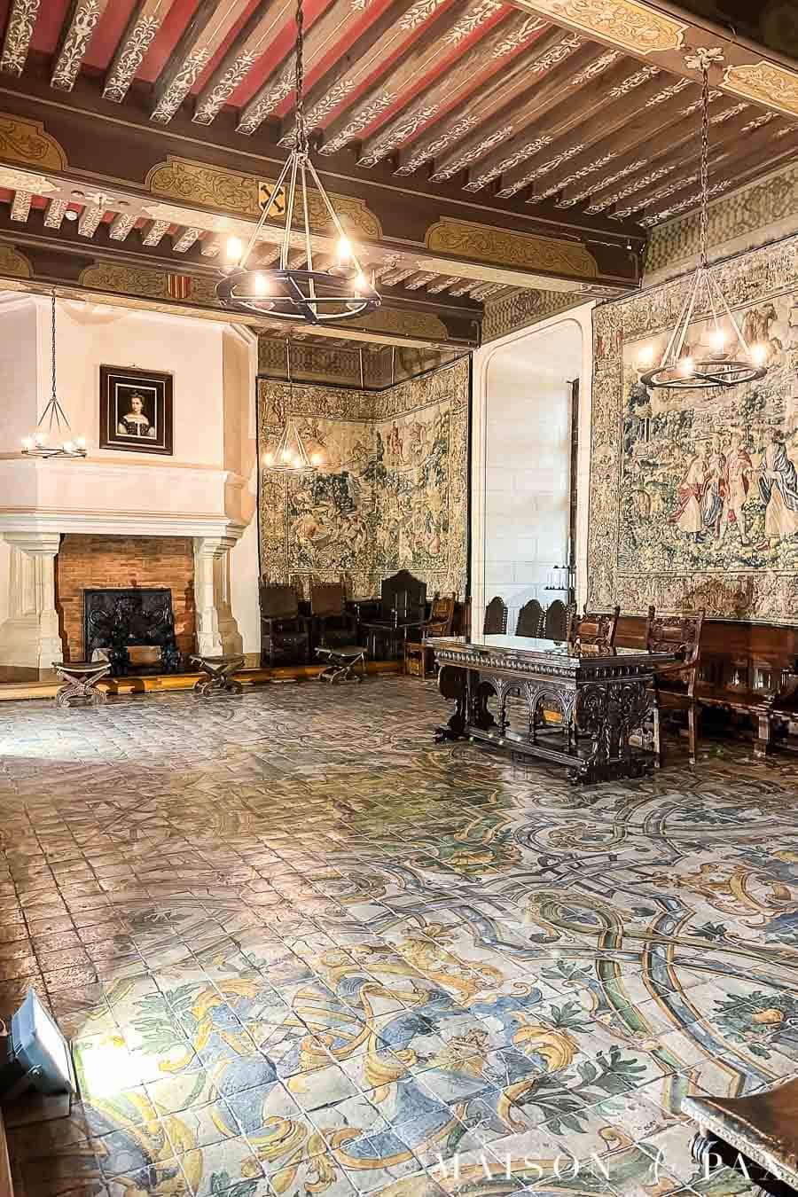 elegant renaissance great hall with large stone fireplace