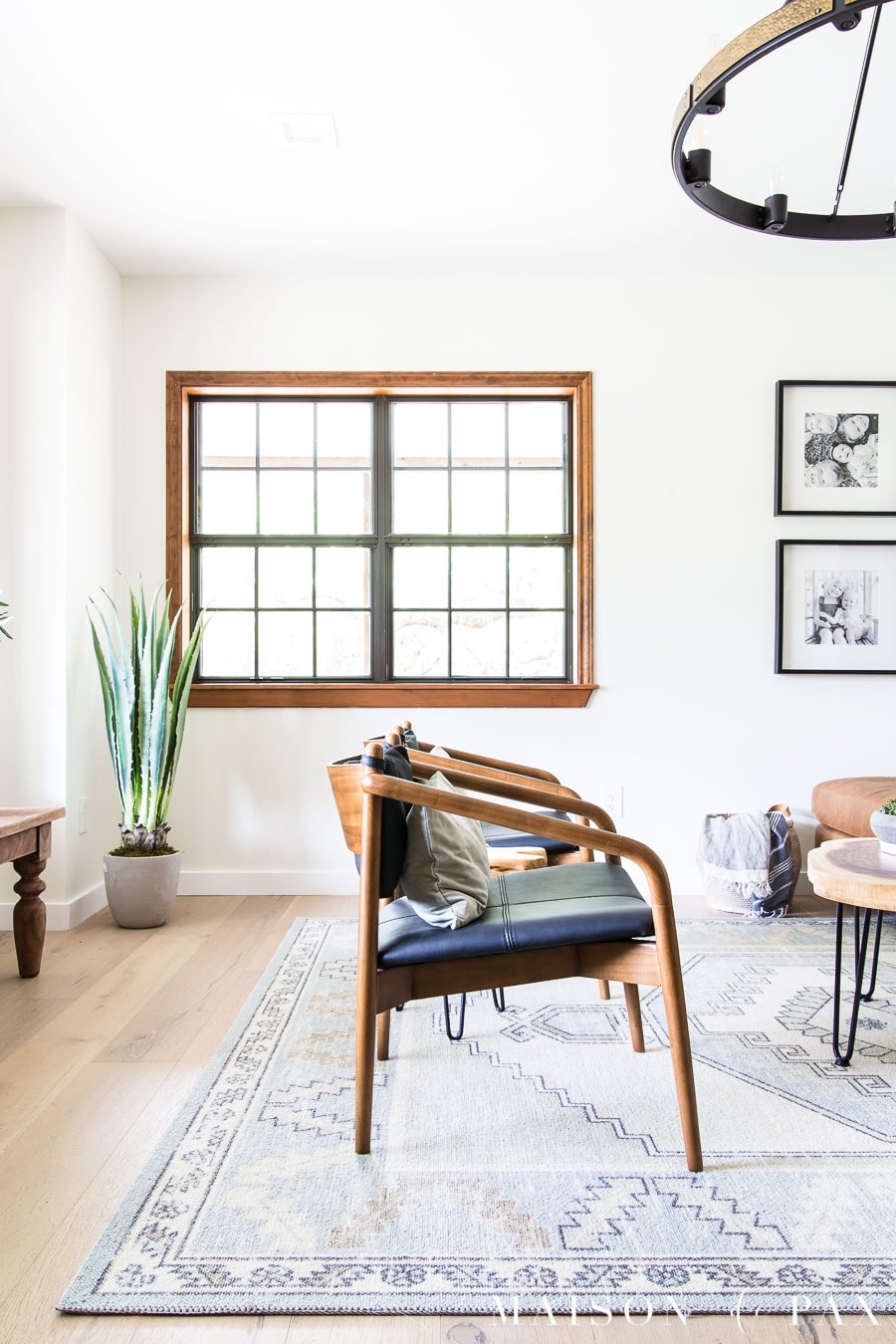 open wood and leather armchairs mid century modern | Maison de Pax