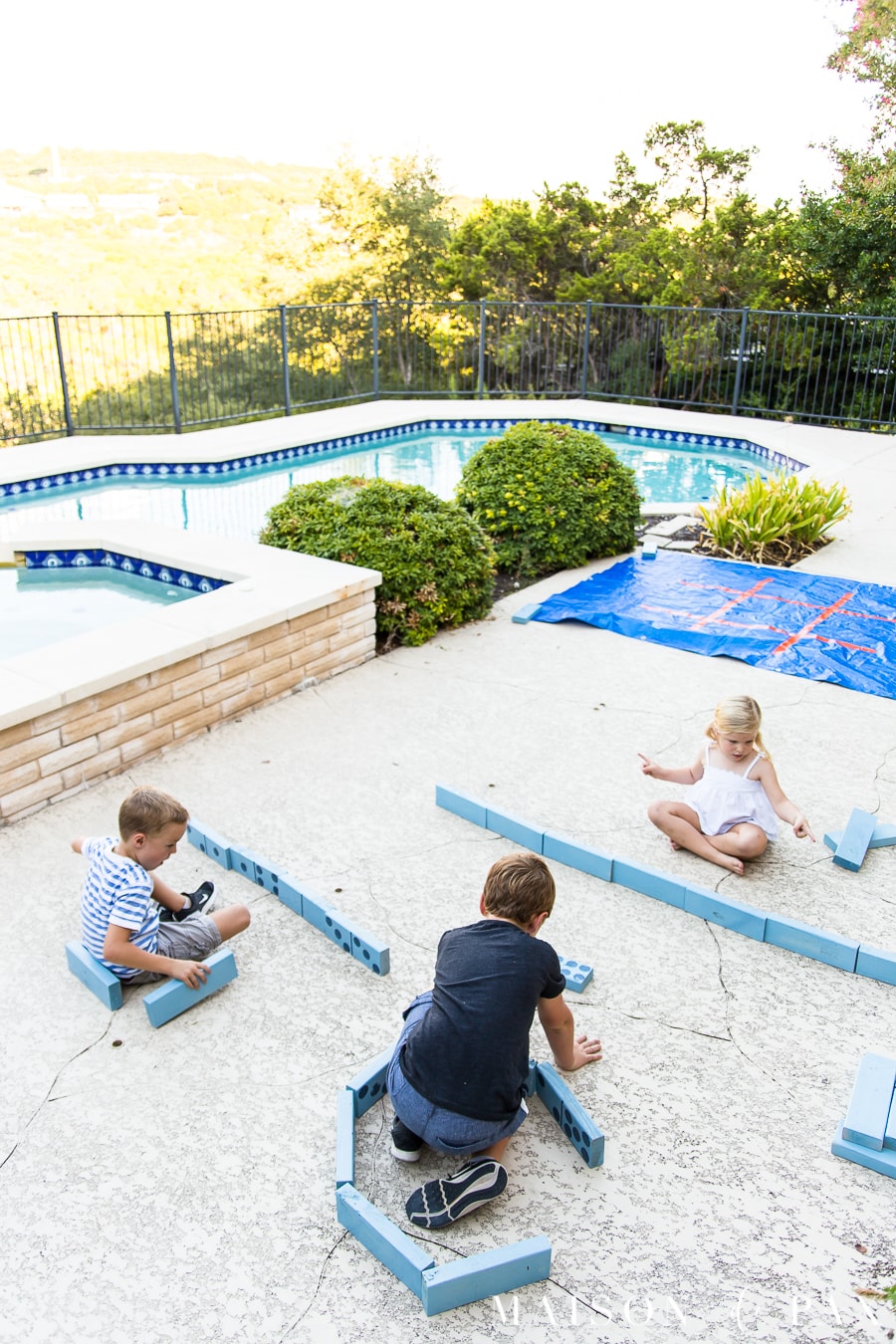 Make giant dominoes and tic tac toe with your kids: find this and other family projects plus tips for completing project with kids! #familyfun #familyproject #outdoorgames #kidfriendlyproject #diyproject