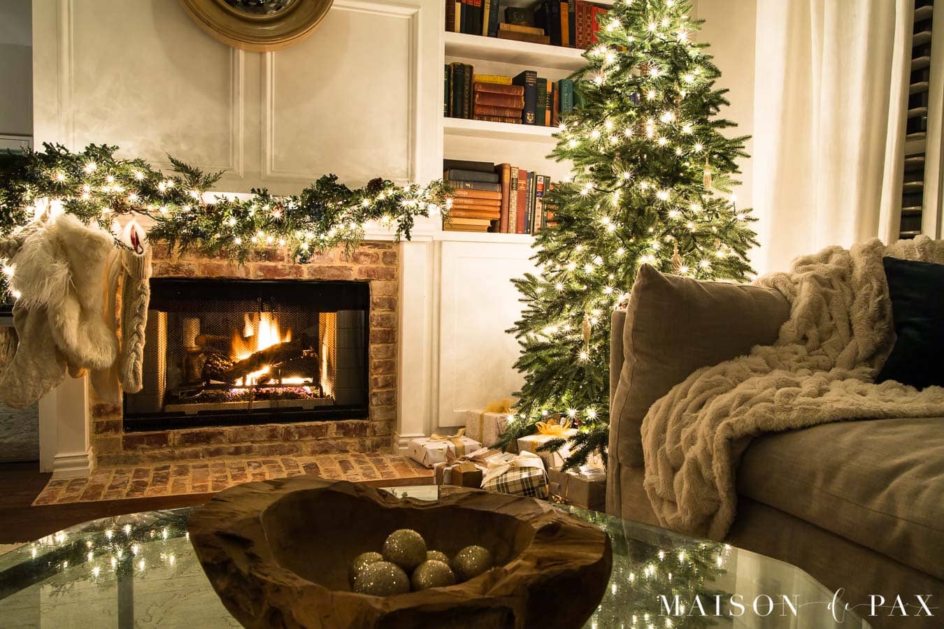roaring fire and christmas lights | maison de pax