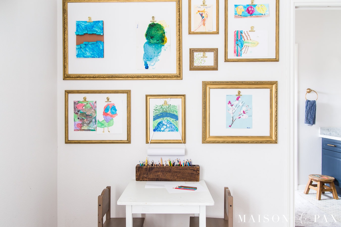 gold frames with clips to display kids' artwork | Maison de Pax