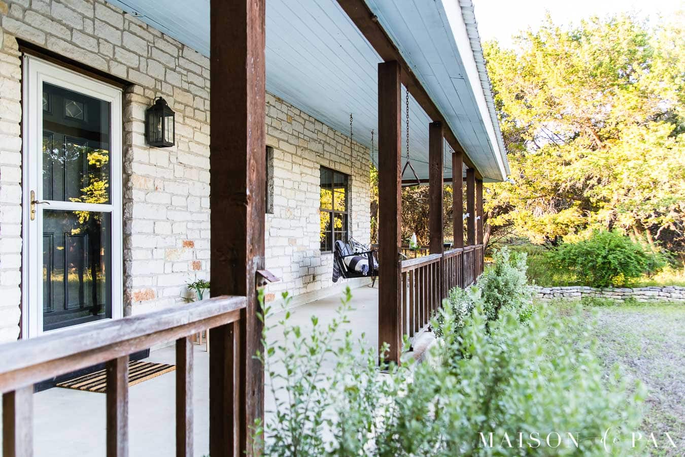cedar posts and railings on porch with haint blue ceiling | Maison de Pax