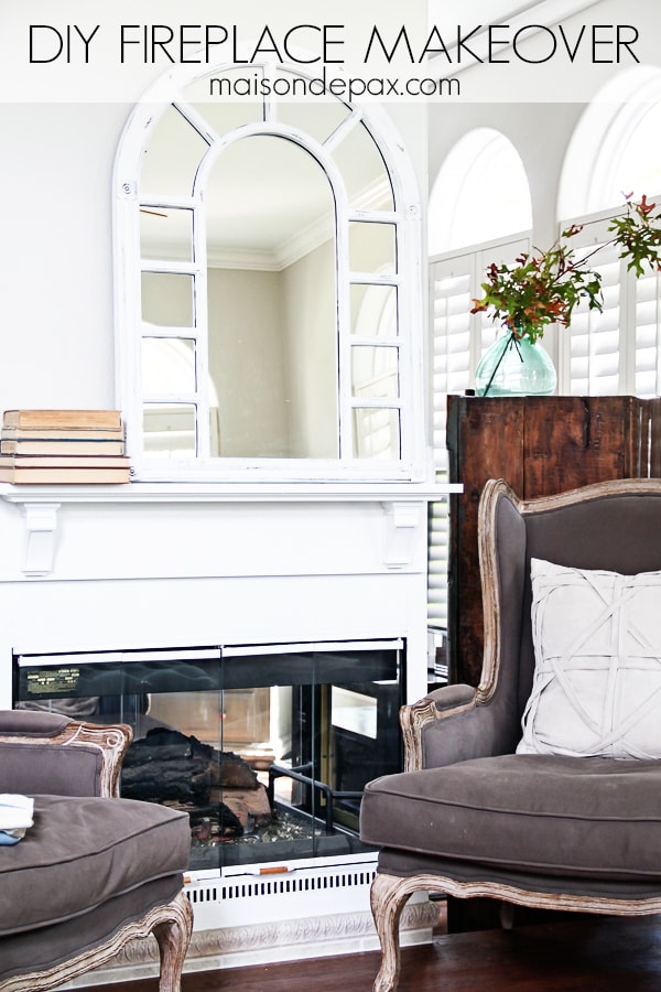 I love this fireplace makeover! Some paint, a simple mantel, and a total transformation of this formerly dated black box fireplace | aiweb9ygdry.cmersite.com