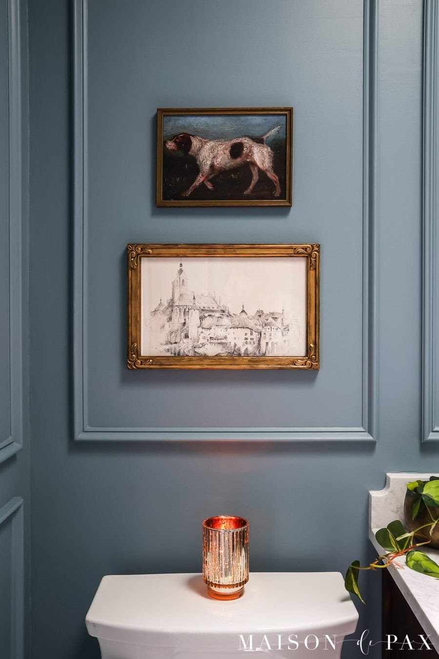 vintage painting and sketches as bathroom artwork 