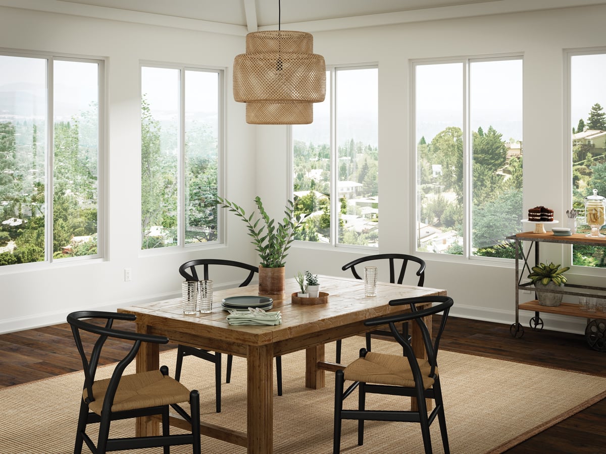 white dining room with beautiful views, modern elements, and rustic farm table | Maison de Pax