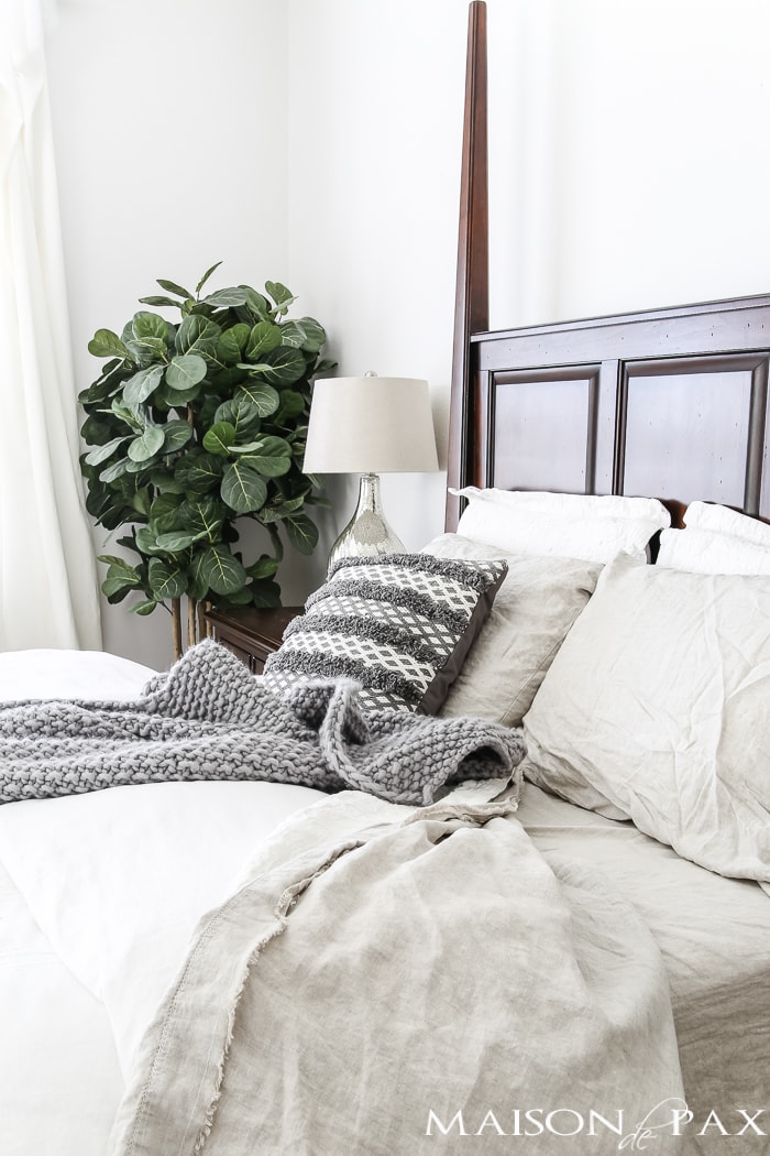 linen sheets and textured gray pillow and throw accent- Maison de Pax