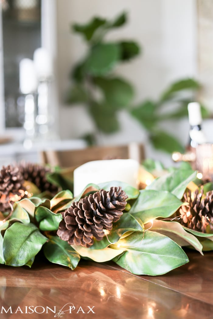 simple greenery and mercury glass makes this French farmhouse style dining room all set for Christmas!