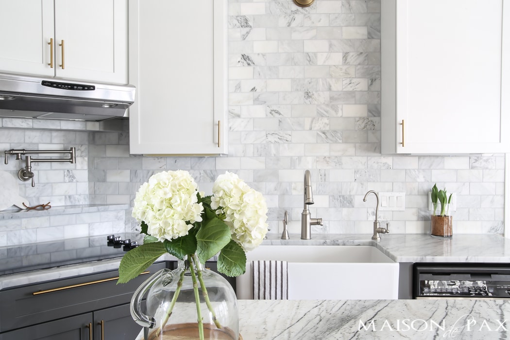 White kitchen with marble countertop- Maison de Pax